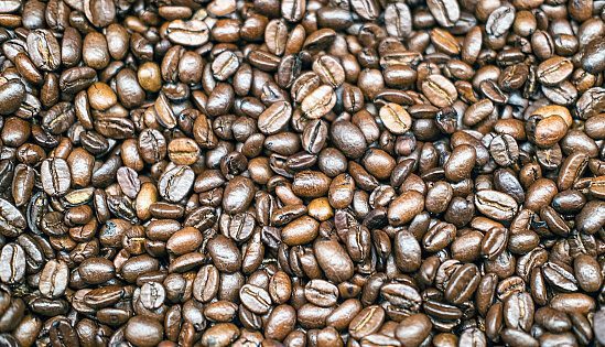 top-view-of-a-big-pile-of-coffee-beans-selective-focus-with-very-of-picture-id1367053017